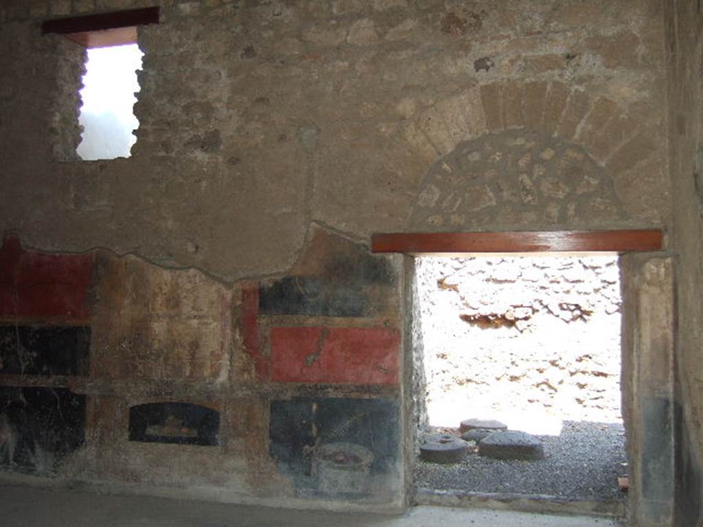 VI.9.2 Pompeii. September 2004. Room 27, east wall and door to room 16.