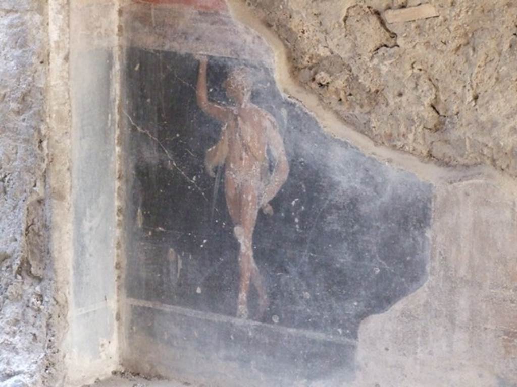 VI.9.2 Pompeii. December 2007. Room 27, painting of standing figure from east end of south wall.