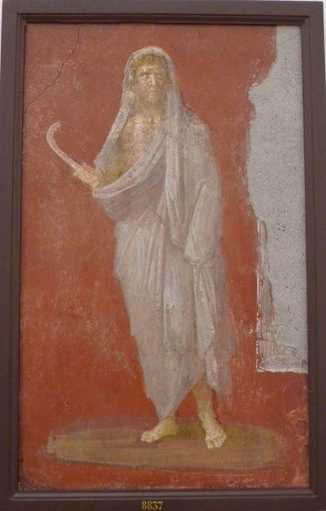 VI.9.6 Pompeii.  Found on 18th June 1828. Room 4.  Area leading to peristyle.  Wall painting of Saturn or Chronos or Chronus holding a sickle. One of two paintings that flanked the door in the deep bay that formed a vestibule for the peristyle.  Now in Naples Archaeological Museum.  Inventory number 8837.  See Helbig, W., 1868. Wandgemälde der vom Vesuv verschütteten Städte Campaniens. Leipzig: Breitkopf und Härtel. (96).