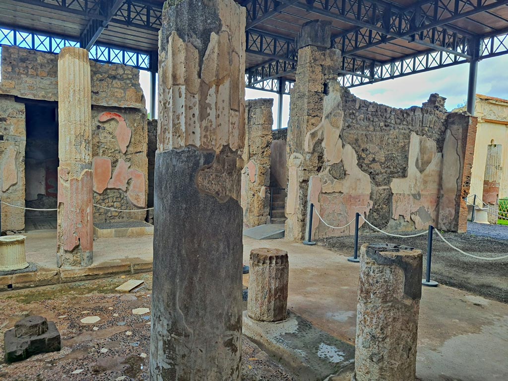 VI.9.6 Pompeii. November 2023. 
Room 3, looking north-east across impluvium in atrium, with north wall of tablinum, on right. Photo courtesy of Giuseppe Ciaramella.

