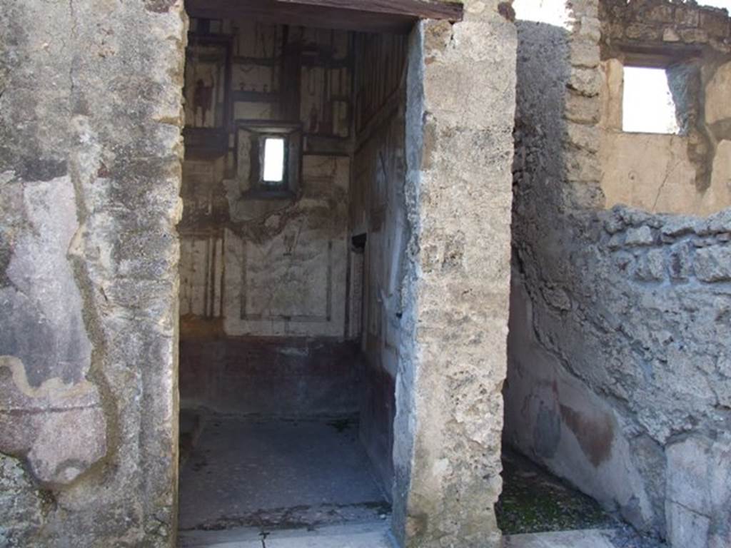 VI.9.6 Pompeii. March 2009. Doorways to rooms 16 and 15, on west side of atrium. 