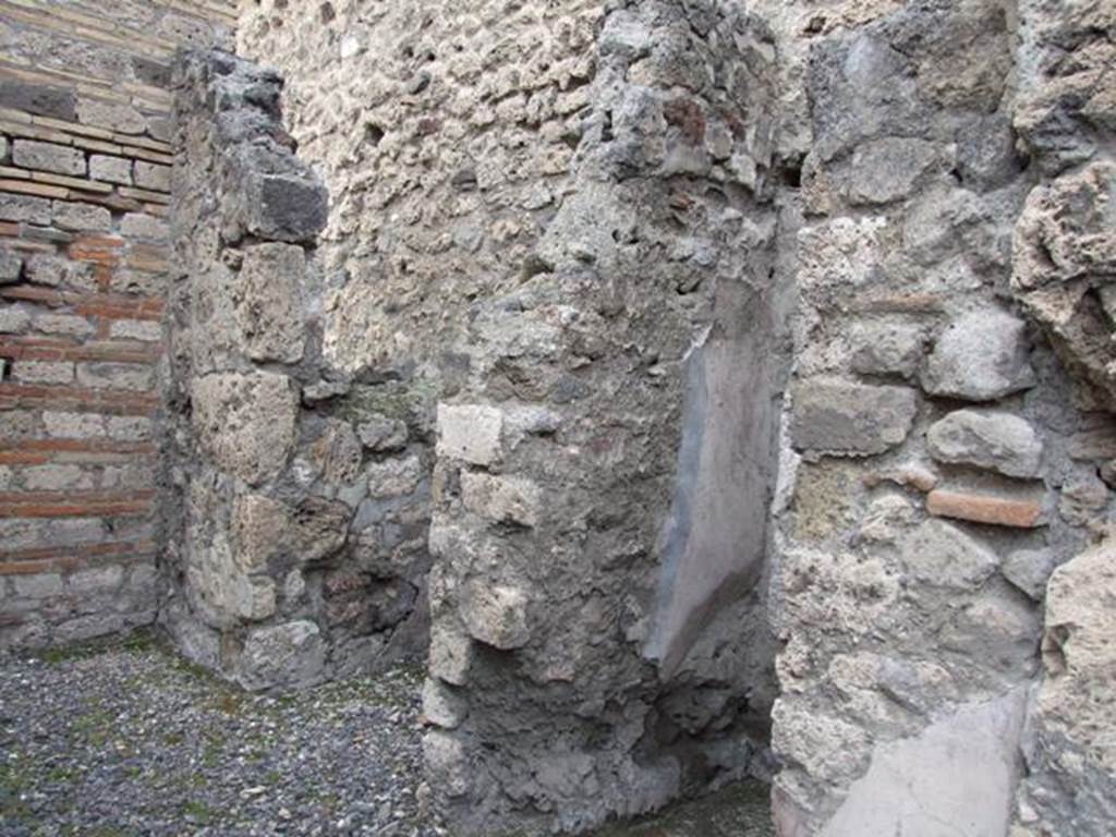 VI.13.11 Pompeii.  Shop.  December 2007.  North wall with remains of staircase and latrine.
