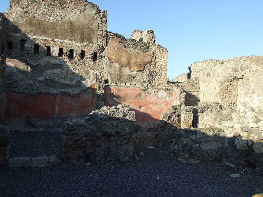 VI.14.8 Pompeii. December 2006. Doorway to small room on right side, with stairs to upper floor ? According to Helbig, visible in the second rear room on the left was an unclear painting. See Helbig, W., 1868. Wandgemlde der vom Vesuv verschtteten Stdte Campaniens. Leipzig: Breitkopf und Hrtel. (1387b).  According to Fiorelli, the painting perhaps showed two litigants in the presence of a magistrate? See Pappalardo, U., 2001. La Descrizione di Pompei per Giuseppe Fiorelli (1875). Napoli: Massa Editore. (p.157).  According to Eschebach, this may also have been known as the Casetta dei Litiganti, presumably named from the painting.  See Eschebach, L., 1993. Gebudeverzeichnis und Stadtplan der antiken Stadt Pompeji. Kln: Bhlau. (p.209)
