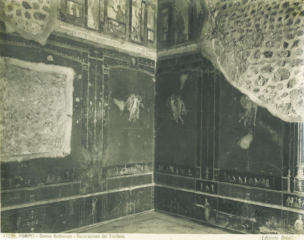 VI.15.1 Pompeii. Old undated photograph by Brogi, no.11229. 
Upper north-east corner in room of the cupids or cherubs, with floating figures in centre of panels. Photo courtesy of Rick Bauer.
According to PPM –
The “flying couple” in the centre of the red east panel on the north wall have been identified as Bacchus and Ariadne.
See Carratelli, G. P., 1990-2003. Pompei: Pitture e Mosaici: Vol. V. Roma: Istituto della enciclopedia italiana, (p.549 and no.136).
Kuivalainen comments –
Bacchus and Ariadne as floating figures are rare, but on account of the counterpart figures in the room these two can also be interpreted plausibly as gods. The difference between this kind of a simple depiction and the more elaborate mythological settings for Bacchus and Ariadne has been noted; the figures resemble satyrs and bacchants, but their motions are calmer and, besides, the male figure does not have satyr’s ears.”
See Kuivalainen, I., 2021. The Portrayal of Pompeian Bacchus. Commentationes Humanarum Litterarum 140. Helsinki: Finnish Society of Sciences and Letters, (p.128-9, D6).
