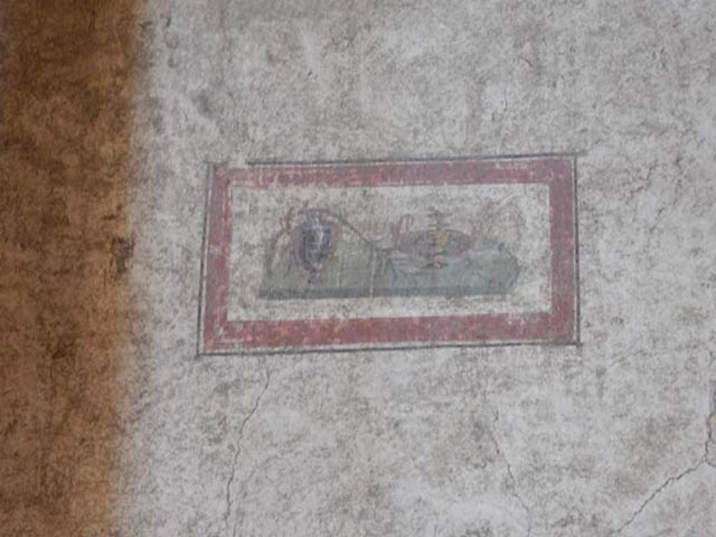 VI.15.1 Pompeii. May 2017. Painted panel from south end of west wall. Photo courtesy of Buzz Ferebee.
