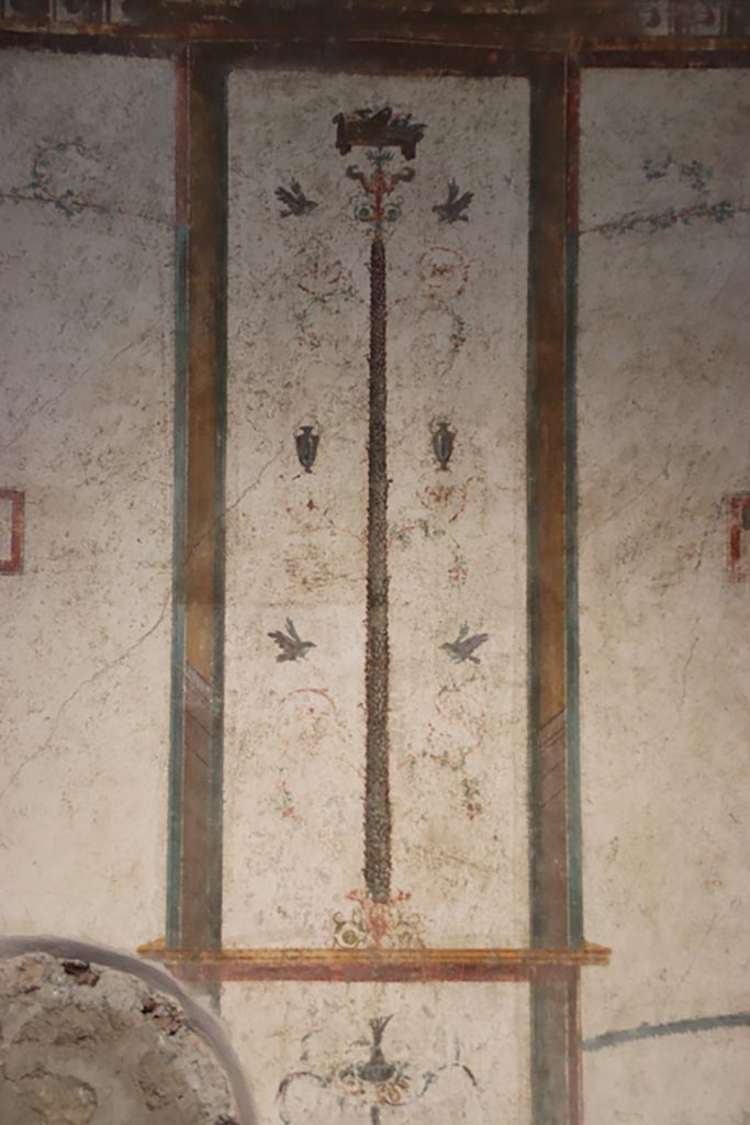 VI.15.1 Pompeii. October 2023. 
Central panel with painted candelabra from north wall. Photo courtesy of Klaus Heese.

