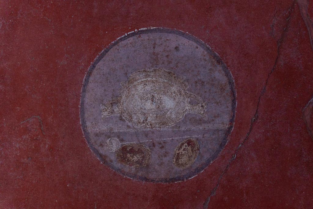VI.16.15 Pompeii. January 2024. Room F, medallion painting from red panel at north end of west wall. Photo courtesy of Johannes Eber.

