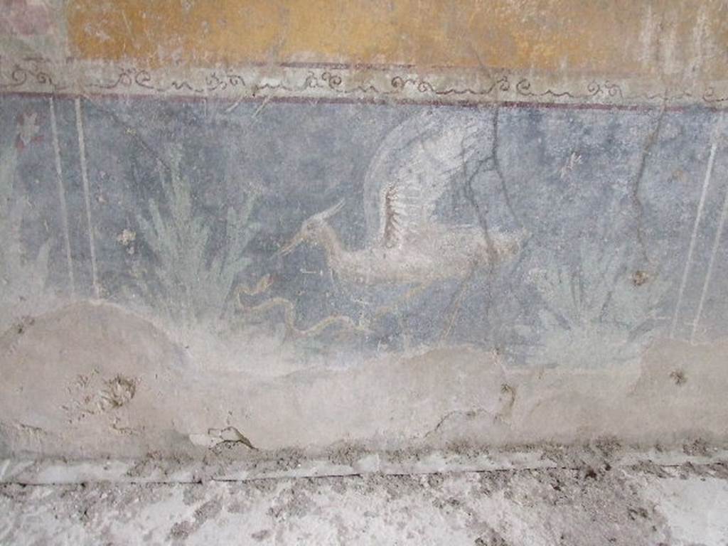 VI.16.15 Pompeii. December 2006. West wall of room F with painting of bird and plants.
