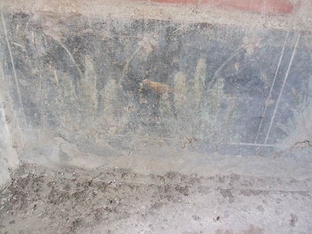 VI.16.15 Pompeii. December 2006. North end of base of east wall of room F with detail of wall painting of plants.