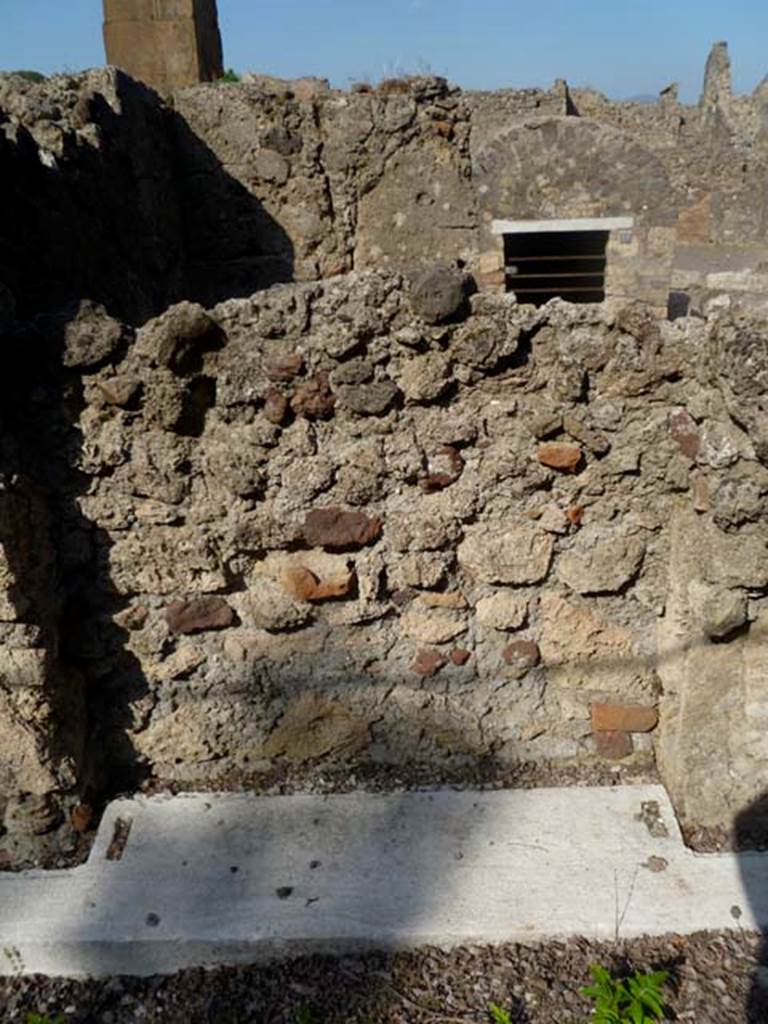 VI.17.17 Pompeii. May 2011. South-east corner of atrium, looking east into a blocked doorway, with the remains of its threshold. This doorway would have connected with VI.17.18. 
