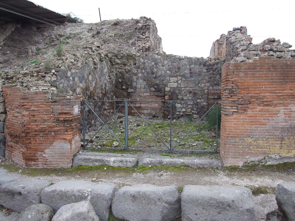 VI.17.38 Pompeii. December 2007. Entrance doorway and west wall.