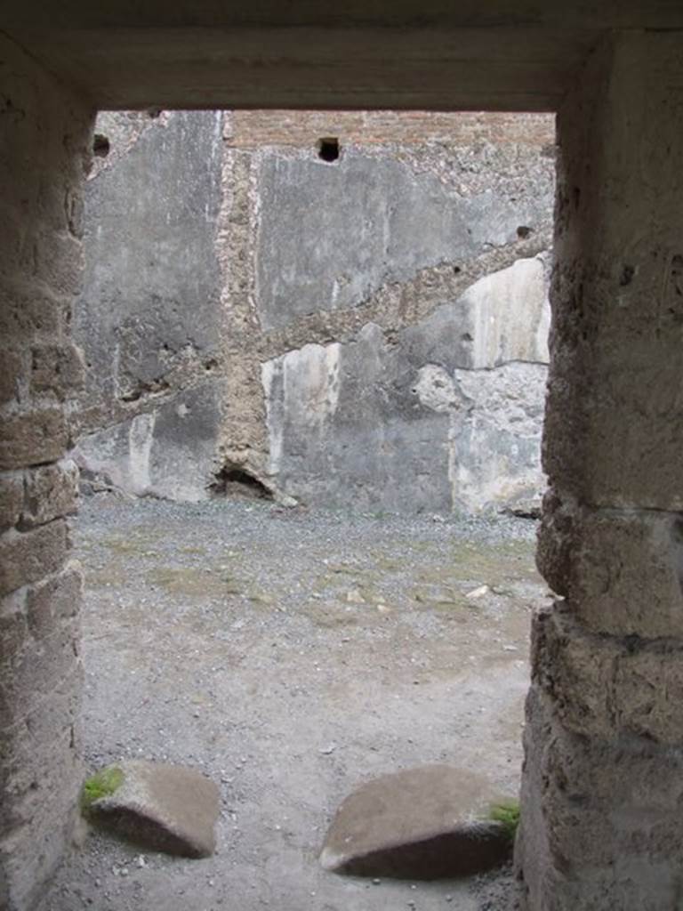 VII.1.8 Pompeii. December 2007. Room 8, womens baths anteroom. Doorway from gymnasium C, leading to womens baths and praefurnium 7.
