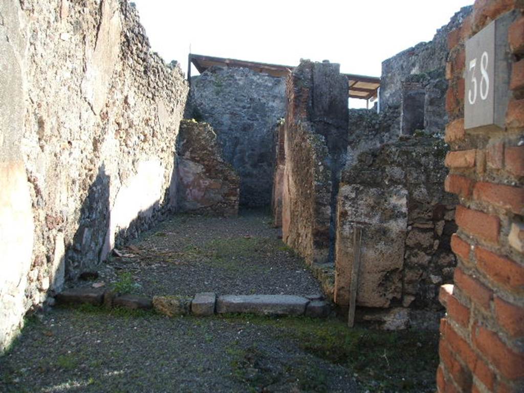 VII.1.38 Pompeii. December 2004. Looking south at site of separate steps to upper floor.