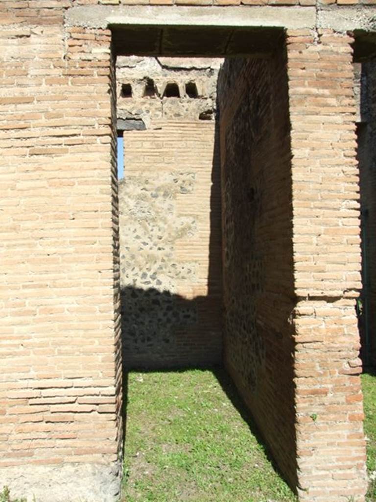 VII.2.18 Pompeii. March 2009. Doorway to room 9, cubiculum, or porter’s room.