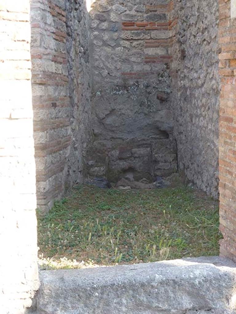 VII.4.54 Pompeii. June 2012. Remains of latrine against the south wall. Photo courtesy of Michael Binns.
