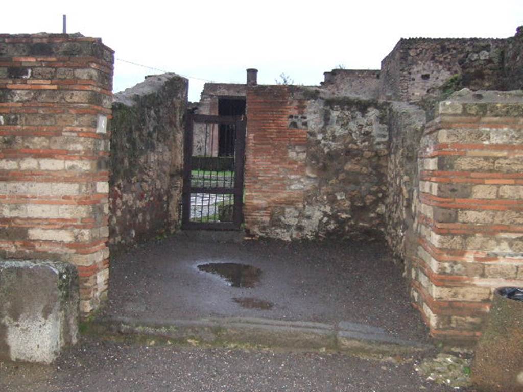 VII.7.4 Pompeii. December 2005. Looking north to entrance doorway.