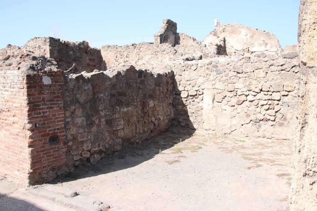VII.7.7 Pompeii. October 2023. West wall of shop-room. Photo courtesy of Klaus Heese.