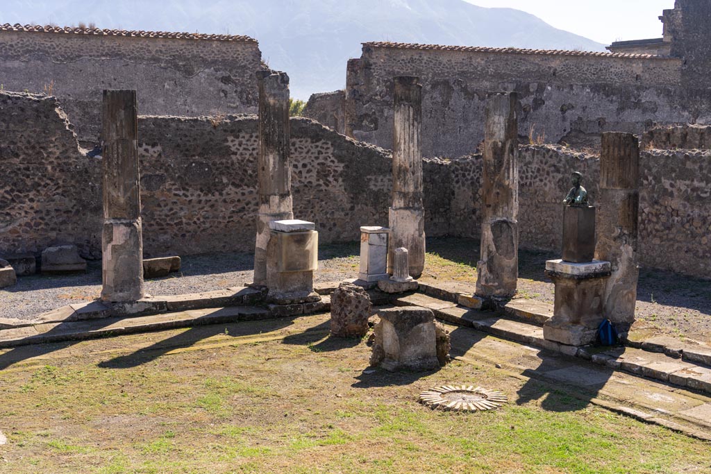 VII.7.32 Pompeii. October 2023. Looking south towards south-west corner of portico of Temple. Photo courtesy of Johannes Eber.

