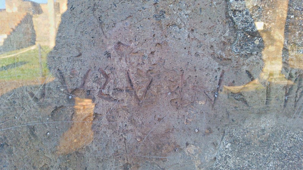 VII.7.32 Pompeii. December 2019. Inscription in south-west corner of Temple. Photo courtesy of Giuseppe Ciaramella.
