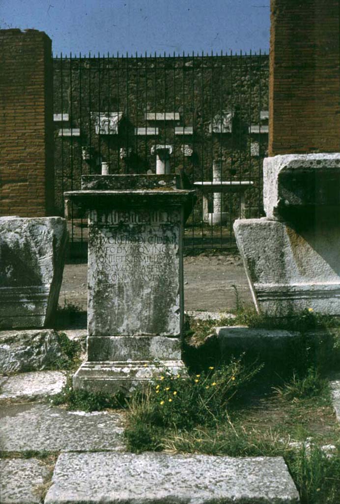 VII.8 Pompeii Forum. May 2010. Pedestal base for M. Lucretio Decidian Rufo set up by M Pilonius Rufus in north-west corner.