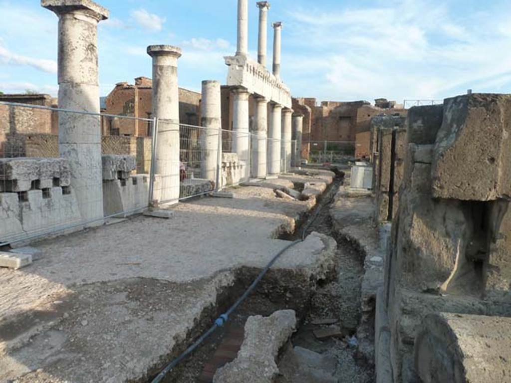 Forum, west side, September 2015. Looking south at detail of surface below the west portico in south-west corner.