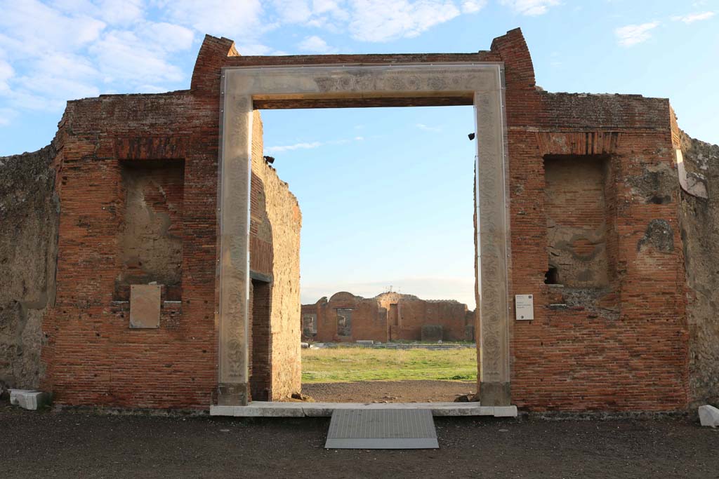 VII.9.1 Pompeii. December 2018. Portico 1. Looking east through entrance doorway 6. Photo courtesy of Aude Durand. 