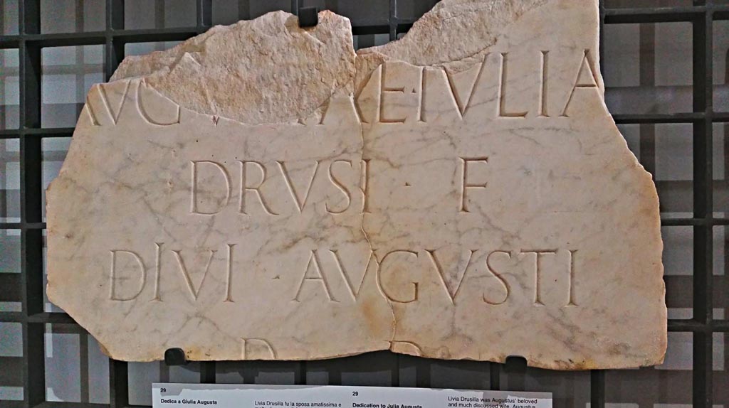 Marble inscription, dedication to Julia Augusta from the Forum area, probably from the so-called Temple of the Lares, 14-42 AD.
The inscription would have read –
“To the Augusta Julia, daughter of Drusus, wife of the divine Augustus, by decree of the decurions”.
Now in Naples Archaeological Museum, inv. 3815, (CIL X, 799). 
Photo courtesy of Giuseppe Ciaramella.
