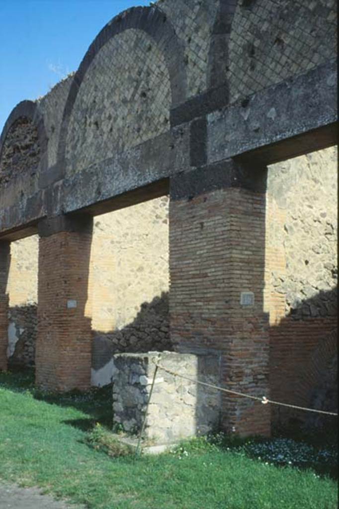 VII.9.11 and 10, on right, Pompeii. October 1992. Doorways in north-east corner of Forum.
Photo by Louis Mric courtesy of Jean-Jacques Mric.

