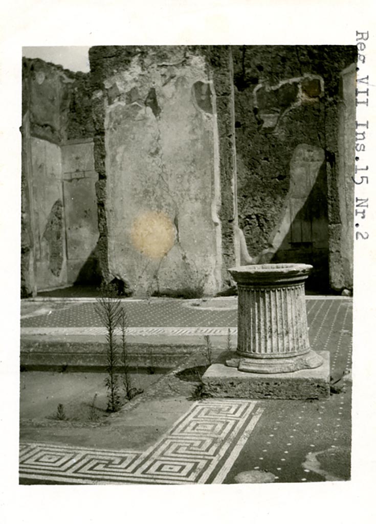 VII.15.2 Pompeii. Pre-1937-39. 
Looking east towards two doorways (cubiculum g, on left, and cubiculum f, on right) on east side of atrium.
Remains of panted decoration are visible.
Photo courtesy of American Academy in Rome, Photographic Archive. Warsher collection no. 444.

