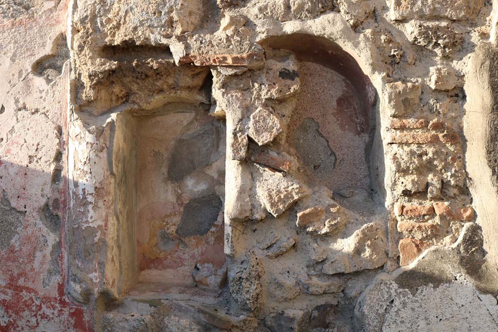 VII.15.5, Pompeii. December 2018. Detail of niches on north wall of garden area. Photo courtesy of Aude Durand.