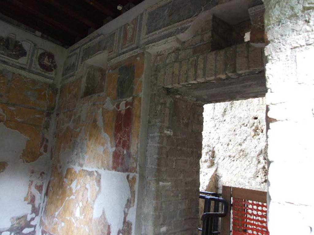 VII.16.a Pompeii. December 2006. Room 1, north-east corner and east wall with door to room 3.