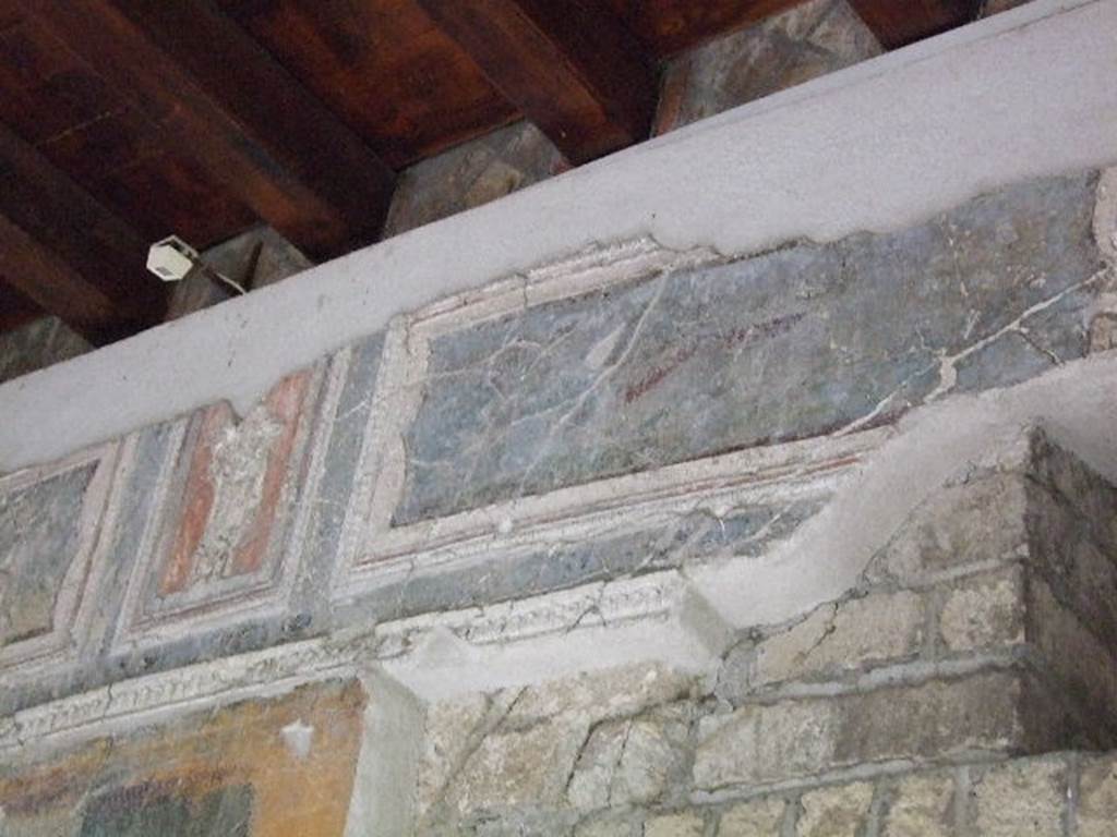 VII.16.a Pompeii. December 2006. Room 1, plasterwork and painting on the upper east wall.