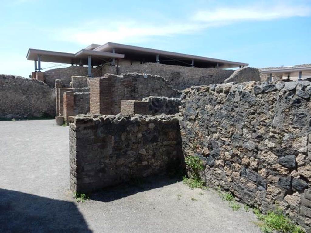 VIII.2.3/5 Pompeii. May 2018. Looking north-west from rear of VIII.2.5, across north portico of peristyle, at rear of tablinum of VIII.2.3.  Photo courtesy of Buzz Ferebee.

