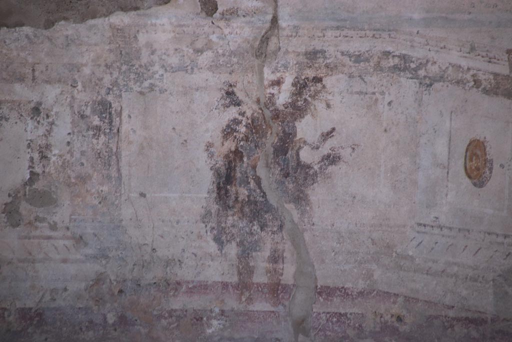 VIII.2.23 Pompeii. October 2022. 
Detail of painted figure from the zoccolo/dado towards the west end of the south wall. Photo courtesy of Klaus Heese.
