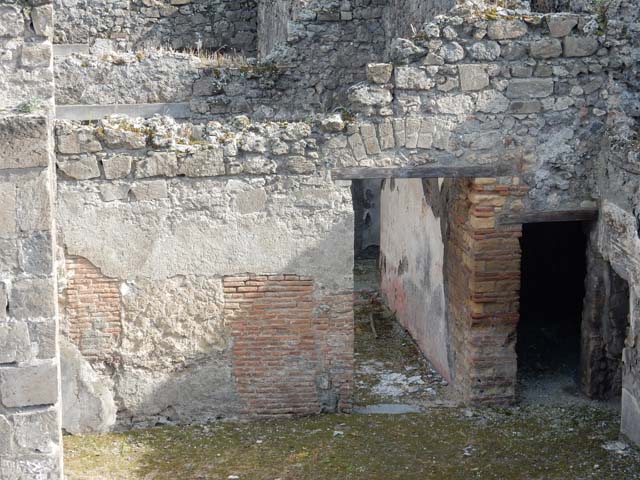 VIII.3.11 Pompeii. October 2022. 
Doorway in south wall, leading into triclinium with window, and through doorway into courtyard near entrance at VIII.3.12.
Photo courtesy of Klaus Heese. 
