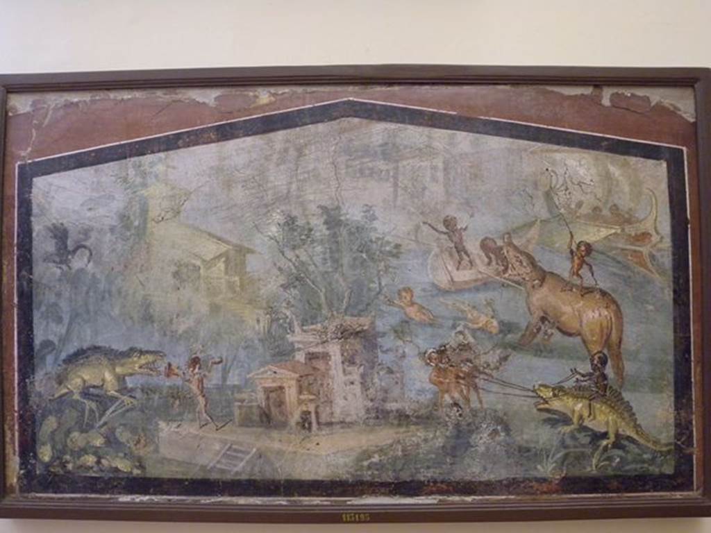 VIII.5.24 Pompeii. Wall painting of Pygmies in a Nile Scene. From a low wall connecting peristyle columns in VIII.5.24.  
Now in Naples Archaeological Museum. Inventory number 113195.
