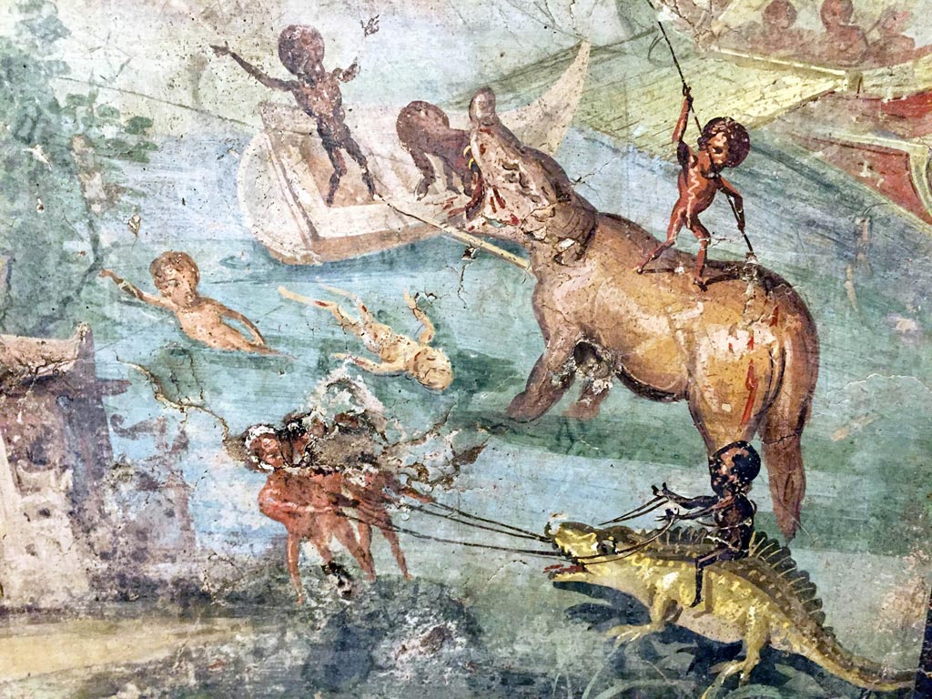 VIII.5.24 Pompeii. 
Detail from a wall painting of Pygmies in a Nile Scene. Found in 1882 from a low wall connecting peristyle columns in VIII.5.24.  
Now in Naples Archaeological Museum. Inventory number 113195.
Photo courtesy of Giuseppe Ciaramella taken December 2019.

