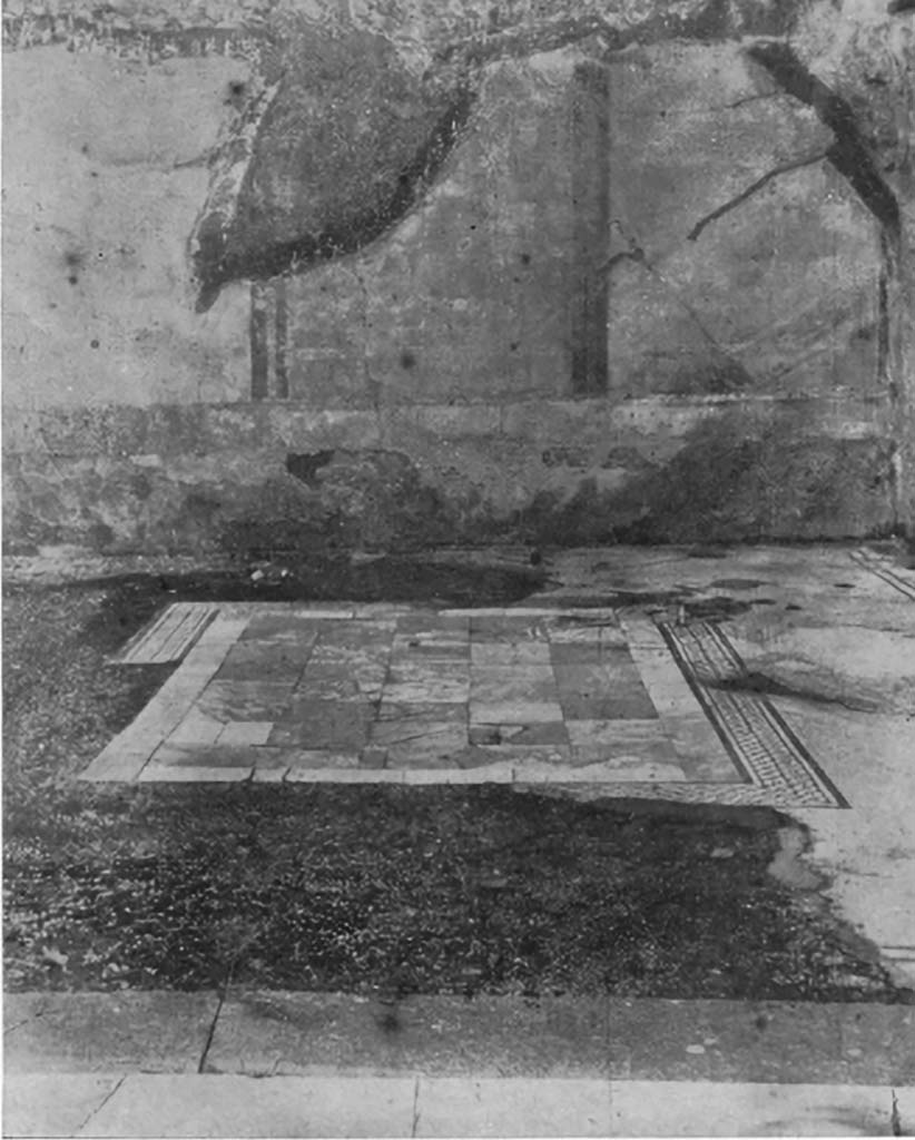 VIII.6.10 Pompeii. c.1930. 
Looking across flooring in triclinium p, shown as a central emblema in opus sectile set in a white mosaic with border of two black lines.
See Blake, M., (1930). The pavements of the Roman Buildings of the Republic and Early Empire. Rome, MAAR, 8, (p.44f, & Pl.8, tav.2, as VIII.6.1)
