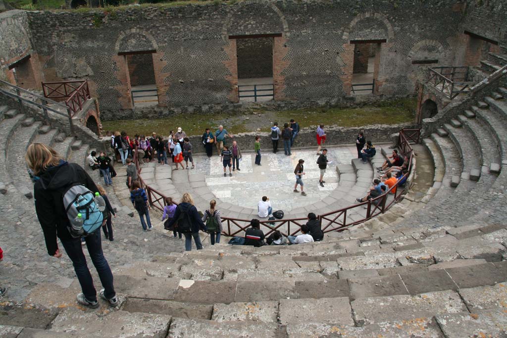 VIII.7.19 Pompeii. April 2010. Looking south towards stage from top of Little Theatre/Odeon.
Photo courtesy of Klaus Heese.
