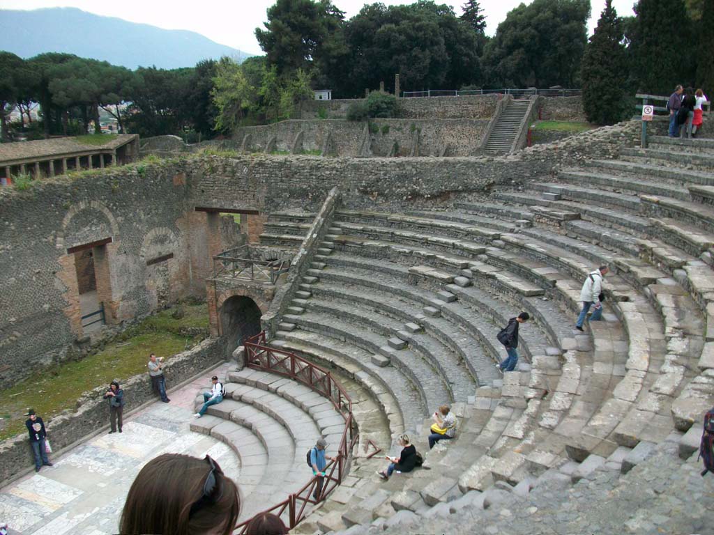 VIII.7.19 Pompeii. April 2010. Looking south-west towards stage, from top of Little Theatre/Odeon.
Photo courtesy of Klaus Heese.
