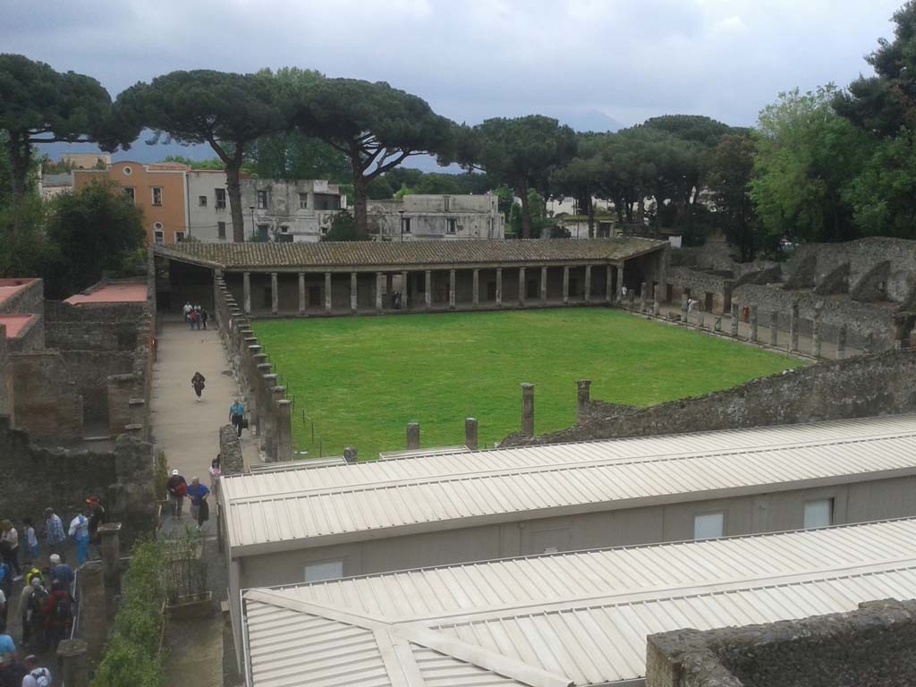 VIII.7.20 Pompeii. April 2014. Large Theatre, looking south to Gladiator’s Barracks. Photo courtesy of Klaus Heese.