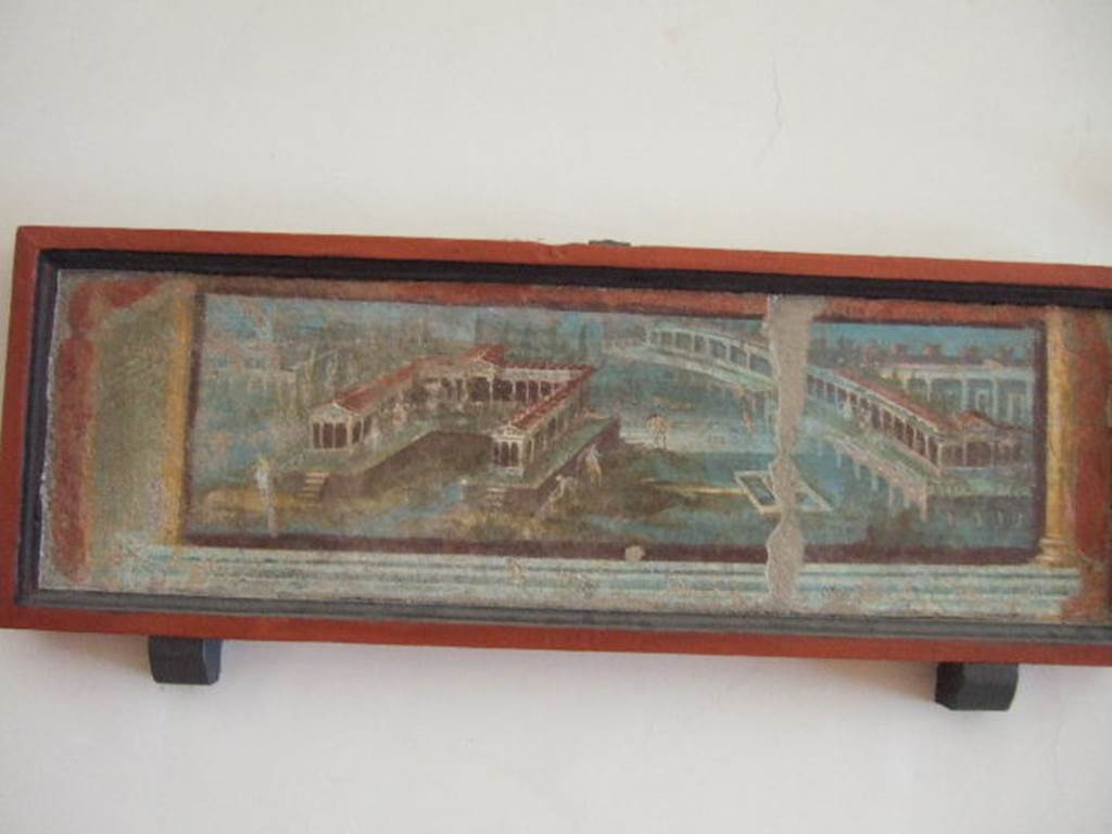 VIII.7.28 Pompeii. Centre of north portico, immediately east of the centre panel (8519).
Marine landscape with a three-sided villa and long porticoed building. 
Now in Naples Archaeological Museum. Inventory number 9505.
