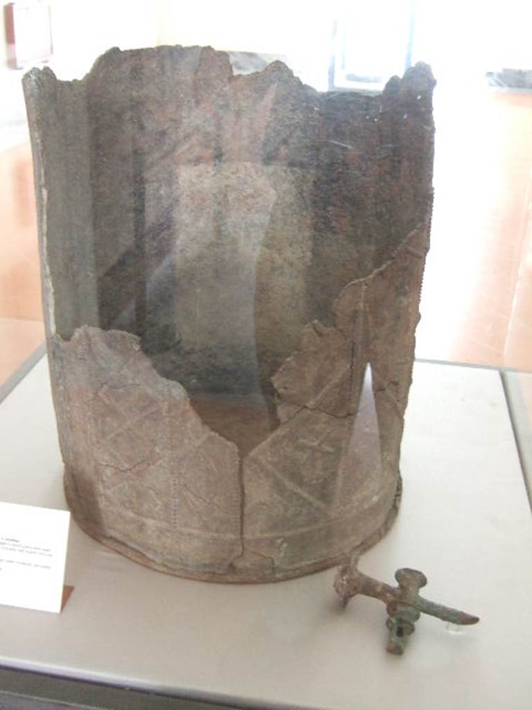 VIII.7.28 Pompeii.  Water container decorated with themes of Isis.  
Found in the north-east corner of the portico.  Now in Naples Archaeological Museum.
