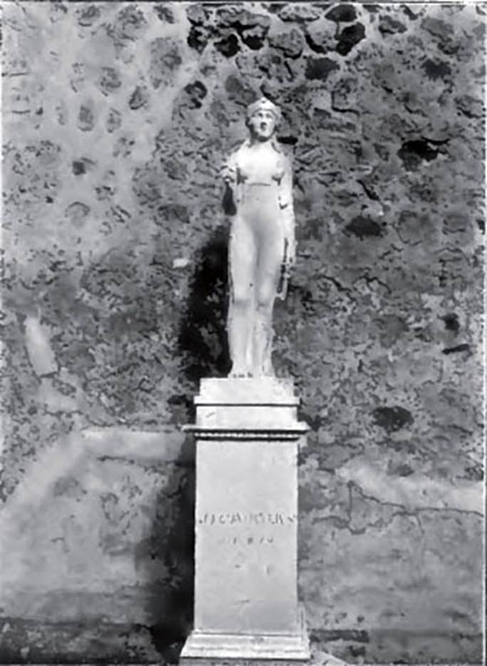 VIII.7.28 Pompeii. 1906. Statue of Isis in situ on north wall.