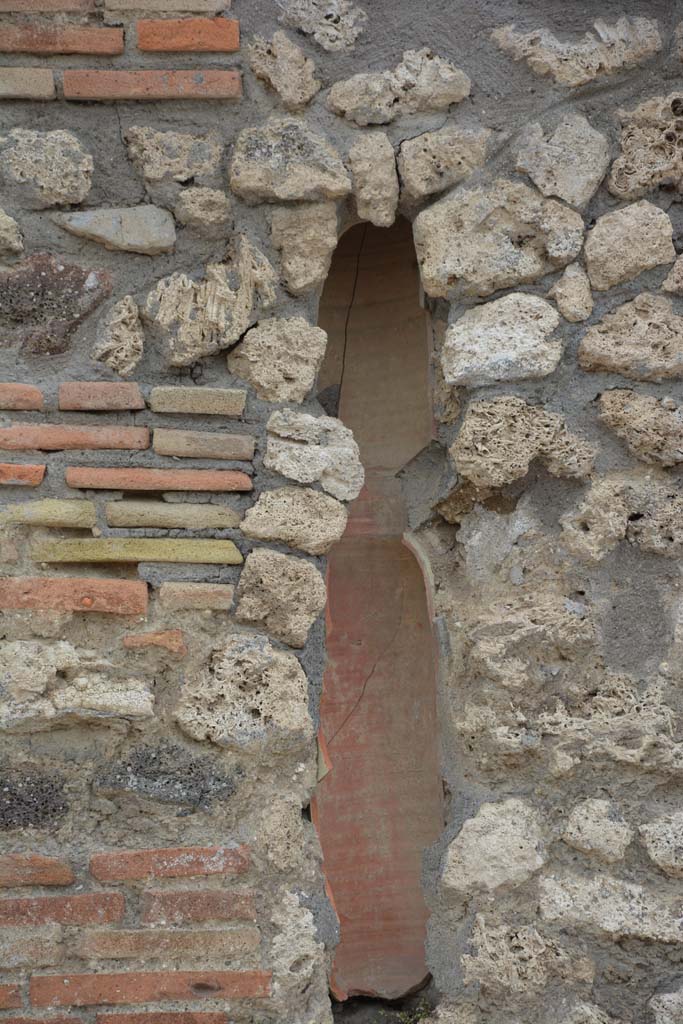 IX.5.8, Pompeii. May 2017. 
Looking south to terracotta downpipe , on pilaster between IX.5.8 and IX.5.7. 
Foto Christian Beck, ERC Grant 681269 DCOR.

