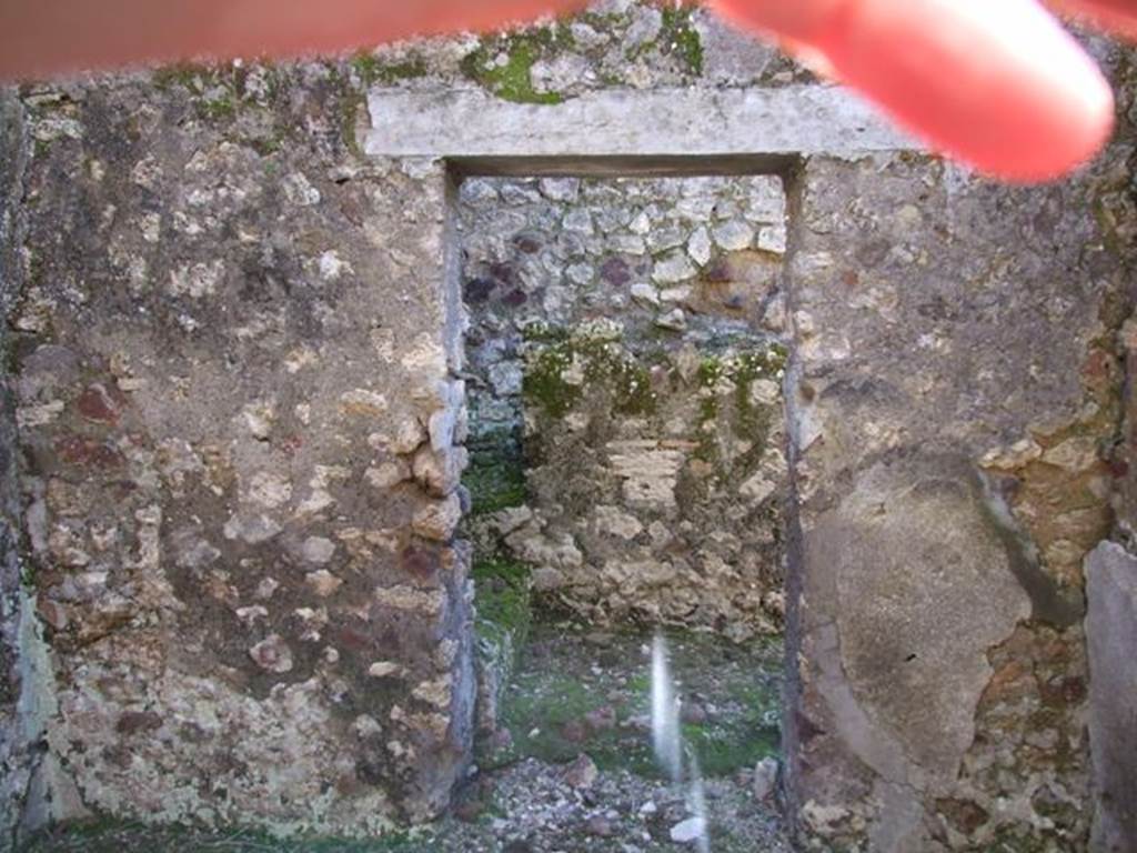 IX.9.a Pompeii. March 2009. Doorway in west wall of cubiculum m, leading to stairs to upper floor.