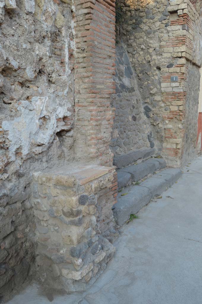 IX.11.1 Pompeii. October 2017. Street altar on west side of steps to IX.11.1, entrance with three steps. 
Foto Taylor Lauritsen, ERC Grant 681269 DCOR.
