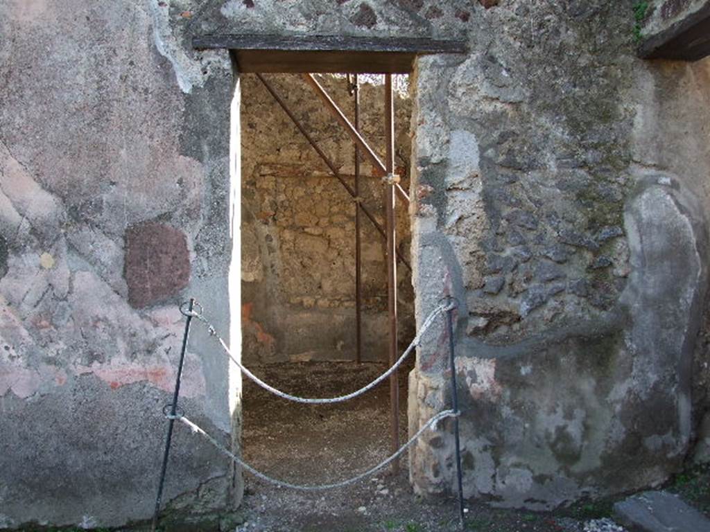 HGW24 Pompeii. December 2006. Doorway to room in south-west corner of peristyle.