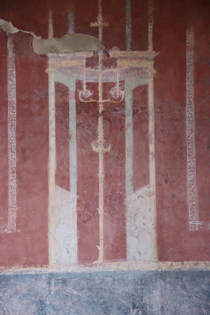 Villa of Diomedes, Pompeii. October 2023. 
Detail of painted candelabra in centre of east wall. Photo courtesy of Klaus Heese.
(Villa Diomedes Project – area 55).
(Fontaine, room 5,9).


