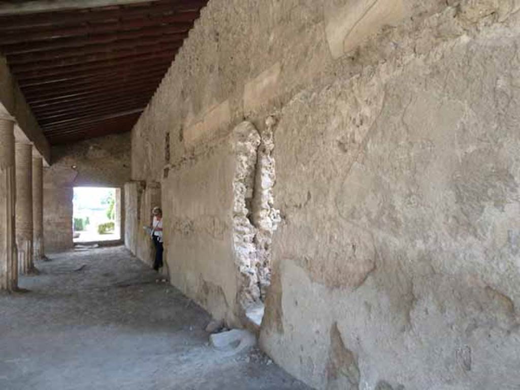 Villa of Mysteries, May 2010. North wall of colonnade, looking west near entrance to room 61, kitchen courtyard.
